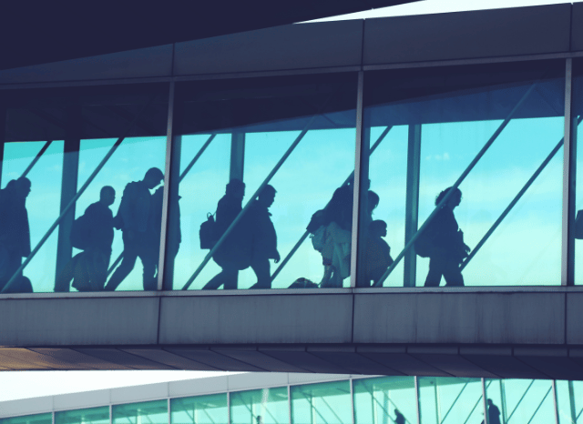 Passengers walking in an airport after a flight